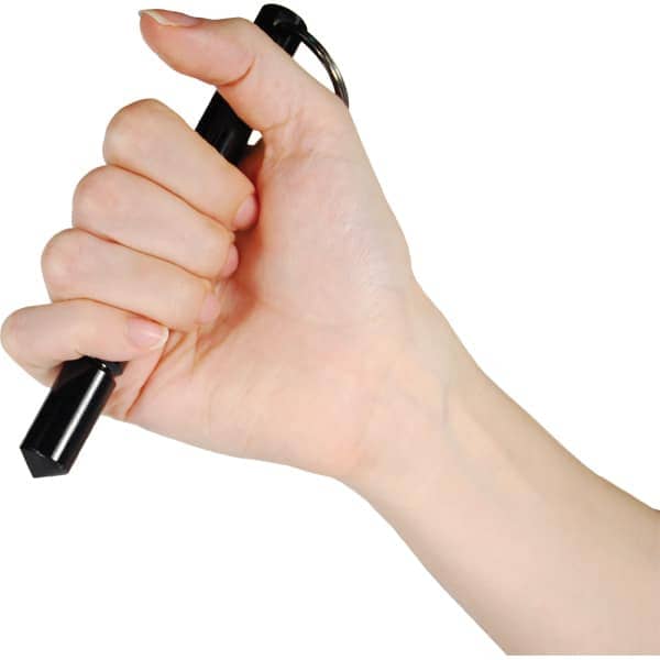 Hand Holding A Kubotan