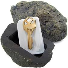 Showing a fake rock diversion safe with keys inside